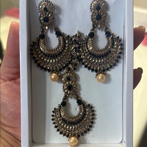 Black and gold earrings and tikka set
